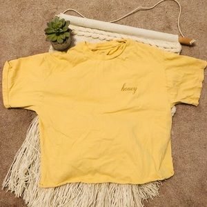 Lighter yellow honey cropped t
